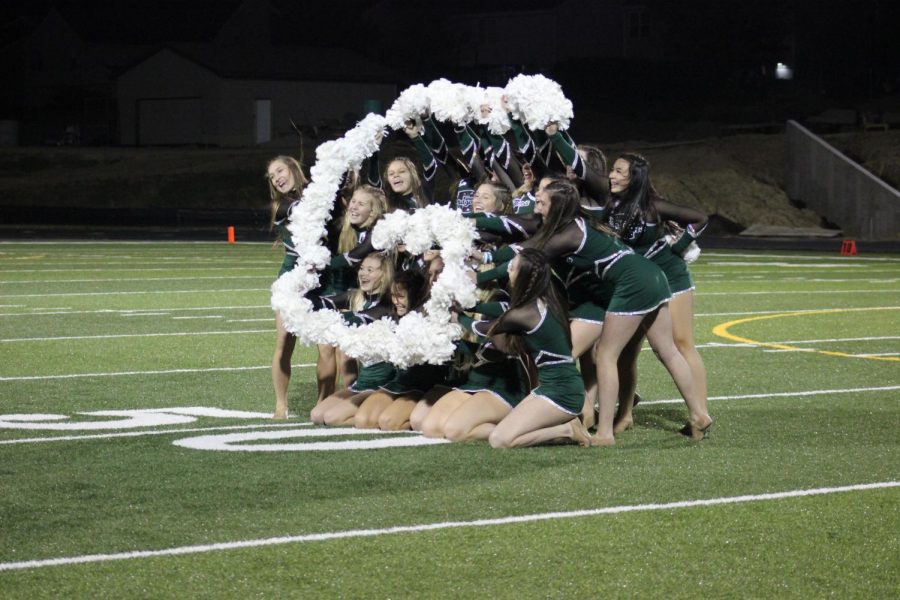 The dance team forms a G for GHS with their pom poms at the home game vs. Fremont on 10/18.