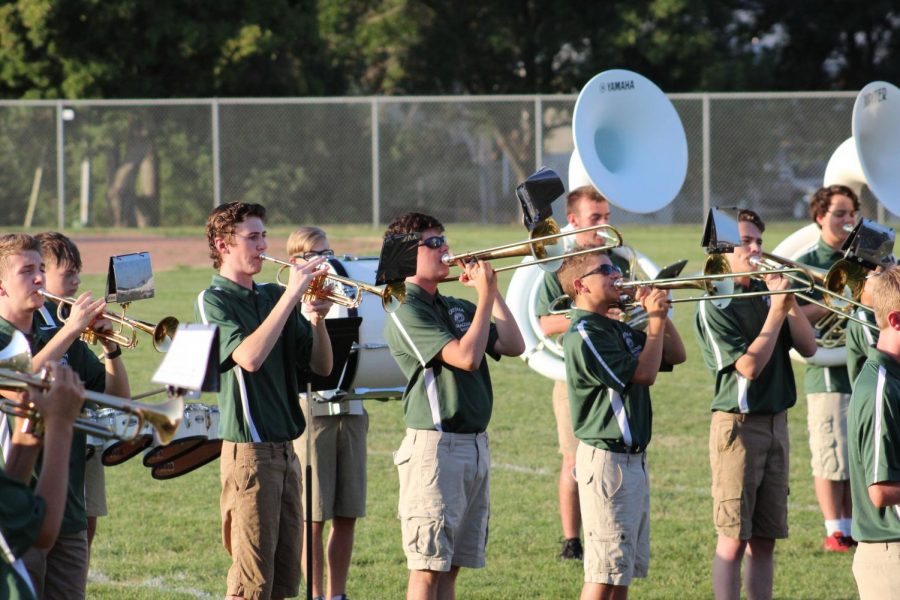The brass players plays their part. (Photo by: Alex Suhr) 
