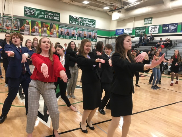 Dancing The Night Away- The speech team dances the Macarena at the Skutt Catholic High School meet. One of my favorite memories was seeing how much fun my competitors were having while they waited for awards to start at Skutt, head coach Mr. White said. They were dancing like fools and having the time of their lives. The team won first place in class A overall.