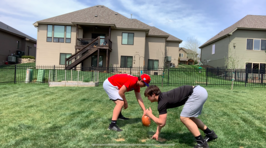 In The Backyard: Tanner Hall (21) and his brother Evan Hall (23) practice their defensive line drills. I believe the platforms are a great way for the coaches to connect with players and encourage them to get out and train, Hall(21) said. I myself have been doing drills given to me by the coaches. The athletes are asked to do drills two to three times a week.