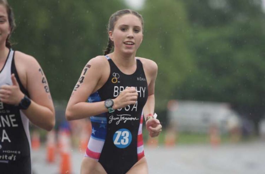 Lilly Brophy finishing her race strong at a national triathlon meet.