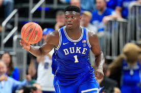 Zion Williamson, the number one pick in the 2019 NBA draft, brings the ball up the court against the University of Kentucky.