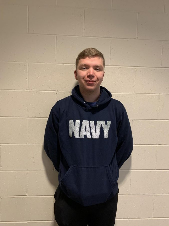 Paul Cornett (21) sports his Navy sweatshirt with hopes of being accepted into the Naval Academy.