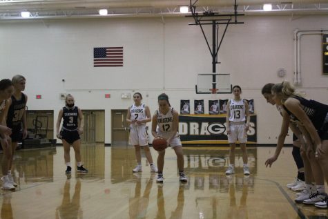 Sinking the free throw to grow their lead, Sydney Woods (22), goes two for two from the line. I practice my free throws a lot, Woods said. They are a very important part of the basketball game. Woods has played JV since freshman year.