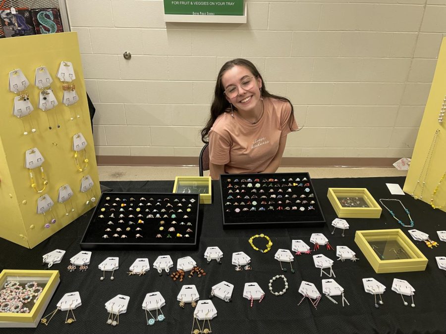 Joyful Jewelry: Smiling next to her booth, Ms. Ashlynn Wheeler sells her handmade jewelry. I love selling my jewelry to people because I love being able to get their feedback on my products, wheeler said. The craft fair is a chance for people to be able to see small businesses that they wouldnt see otherwise.