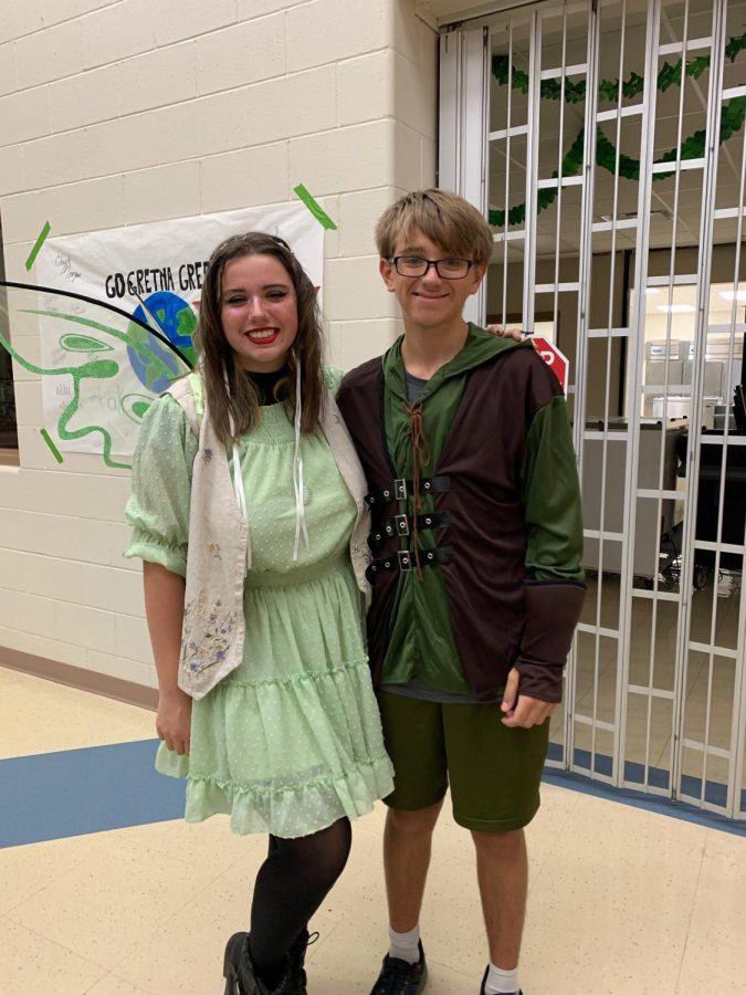 Sibling Cooperation: Lillian Henry (22) decided to thrift most of her costume from a thrift store. I chose this costume because I really like whimsical elements like fairies and mushrooms, Henry said. I was so excited to wear this costume because I thought I looked really good in it and my brother was dressed as Peter Pan. She was very excited for this first annual costume day and enjoyed doing it this year.