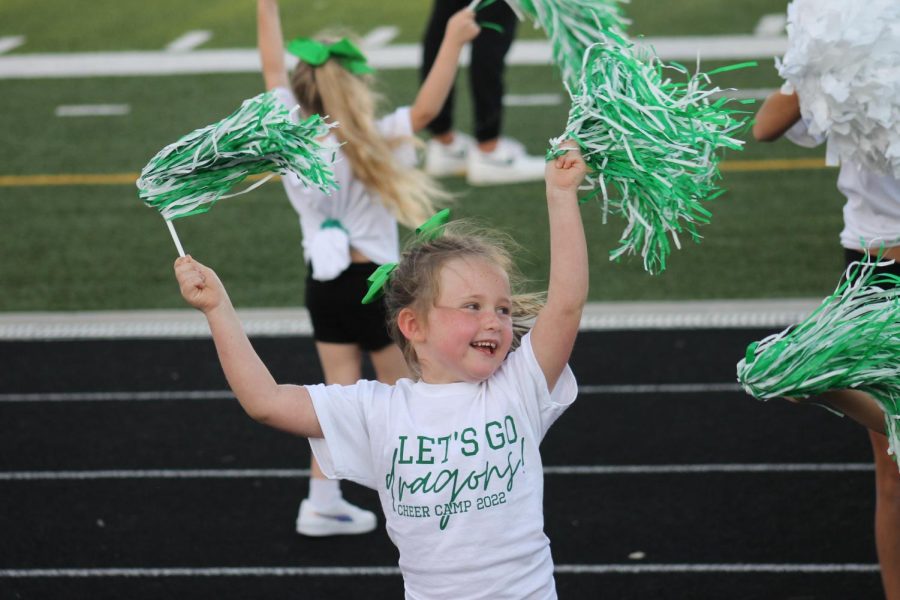Gretna cheer camp dances on the sidelines.