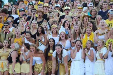 GET LOUD. The students in the GHS student section are packed tight as they cheer for their team on Sept. 2 as they played Omaha Central.  