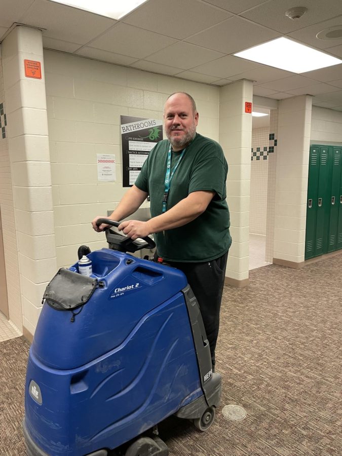 Janitor Bill Prosser works after the end of the school day.  