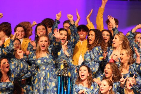 Revolution members celebrate after learning the group was named Grand Champion at Papio Souths Titan Classic.