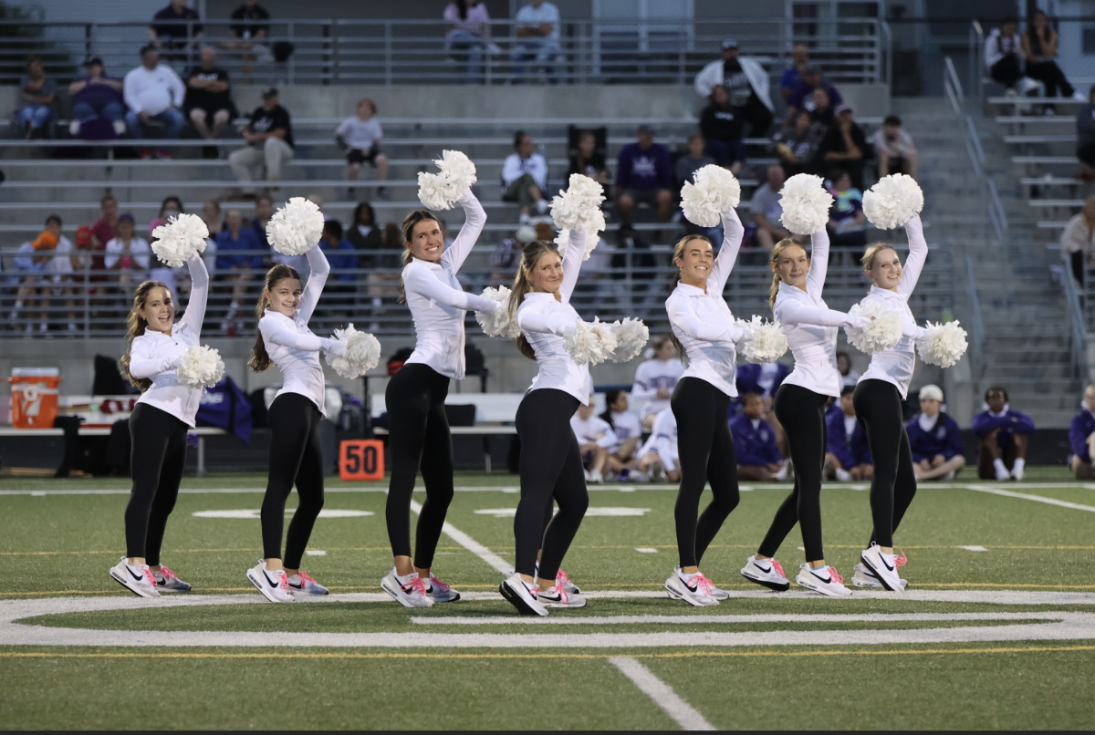 The dance teams from GHS and GEHS performed together at the Dragons homecoming game on Sept. 22. “We still practice together, do competitions together, also basketball games and community performances,” said Lily Blake.