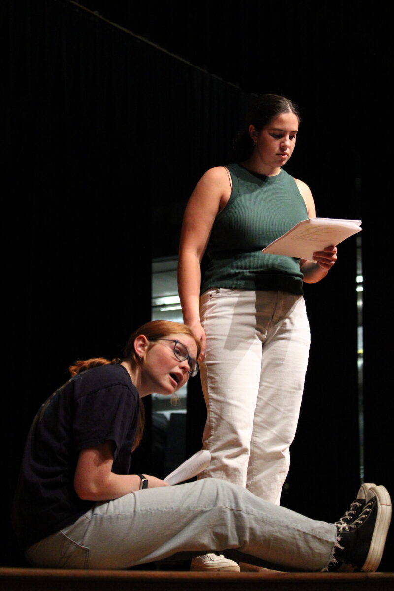 Maya Huber (24) and Roxy Lightle (26) rehearse for the upcoming production, By the Bog of Cats, in the theater.
