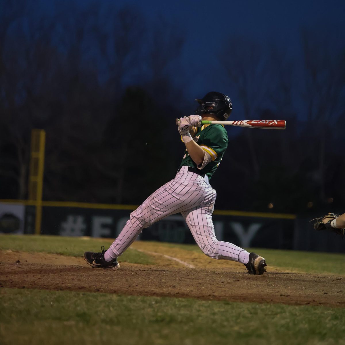 The GHS varsity baseball player getting ready to bat at a game last season. The first game for the 2024 season will be on Mar. 14 against Creighton Prep.