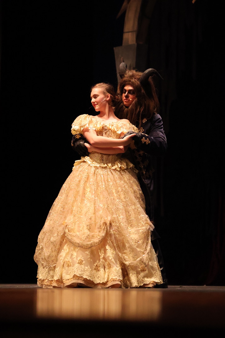Belle (Lydia Edmonds) and The Beast (Jordan Thomas) dance in the second act. 