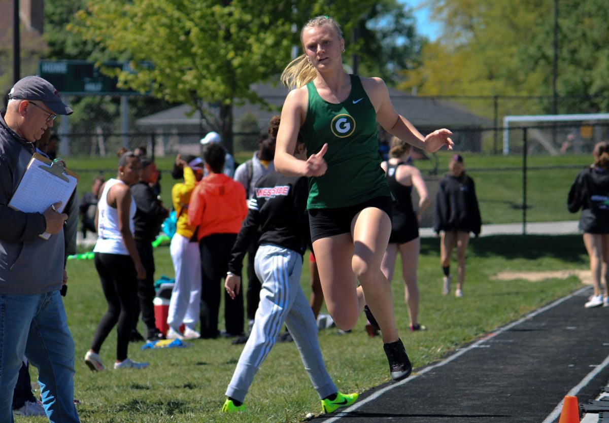 Addison Dostal (24) makes a Triple Jump attempt at the A-1 District Track Meet on May 7. She placed 11th overall with 33 9.5.