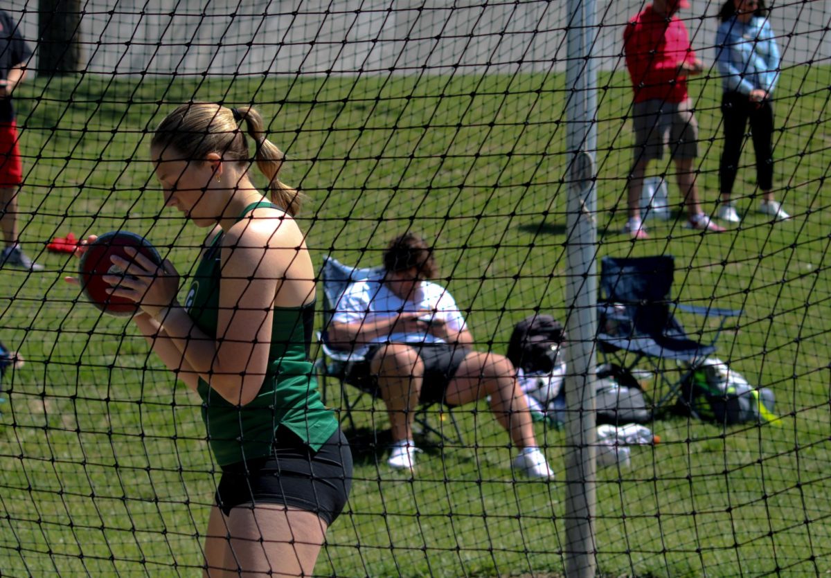 Audrey Wilcoxson (24) prepares to throw in the Discus event at the A-1 District Track Meet on May 7. She placed second overall with 117.
