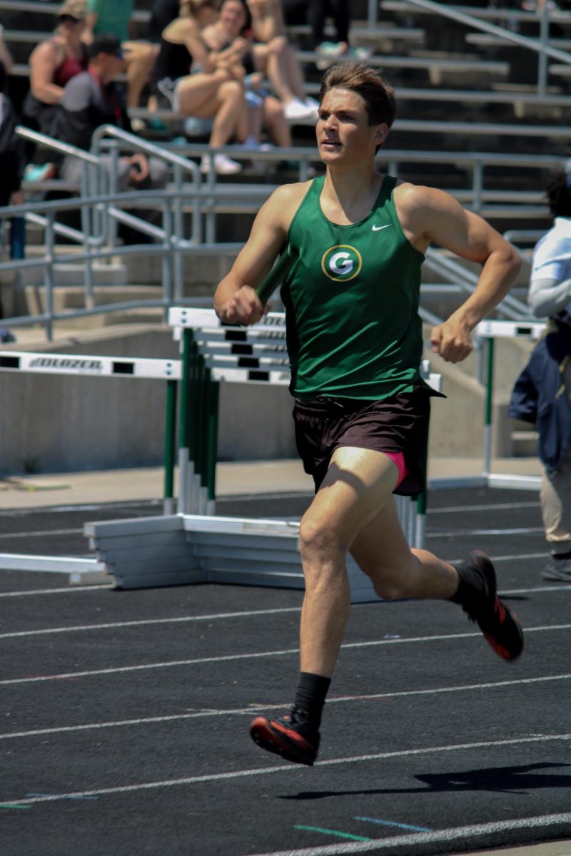 Nolan Ienn (24) runs in the boys 4x800m relay at the A-1 District Track Meet on May 7. They placed fifth with a time of 8:20.62.