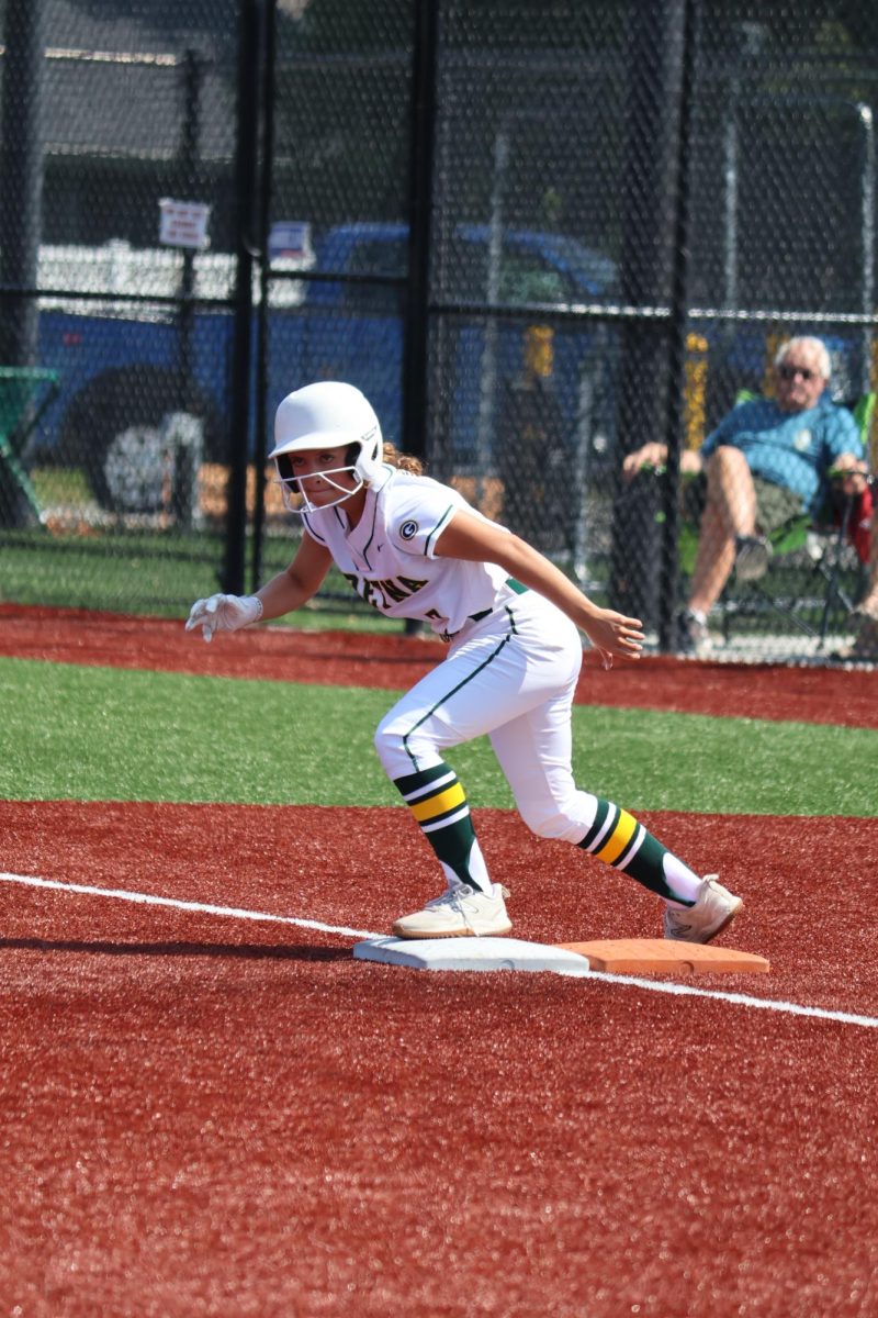 Baserunner Brylee Heard (26) gets ready herself to take off to second base at the Gretna vs. Omaha Marian scrimmage on Saturday, Aug. 17.