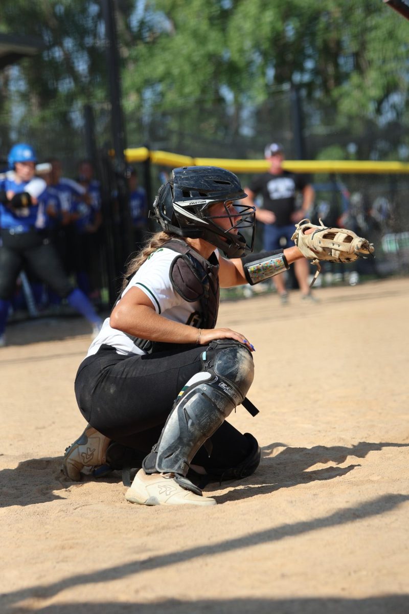 Senior Brylee Rupiper prepares to catch a strike thrown staright to her mitt. 
