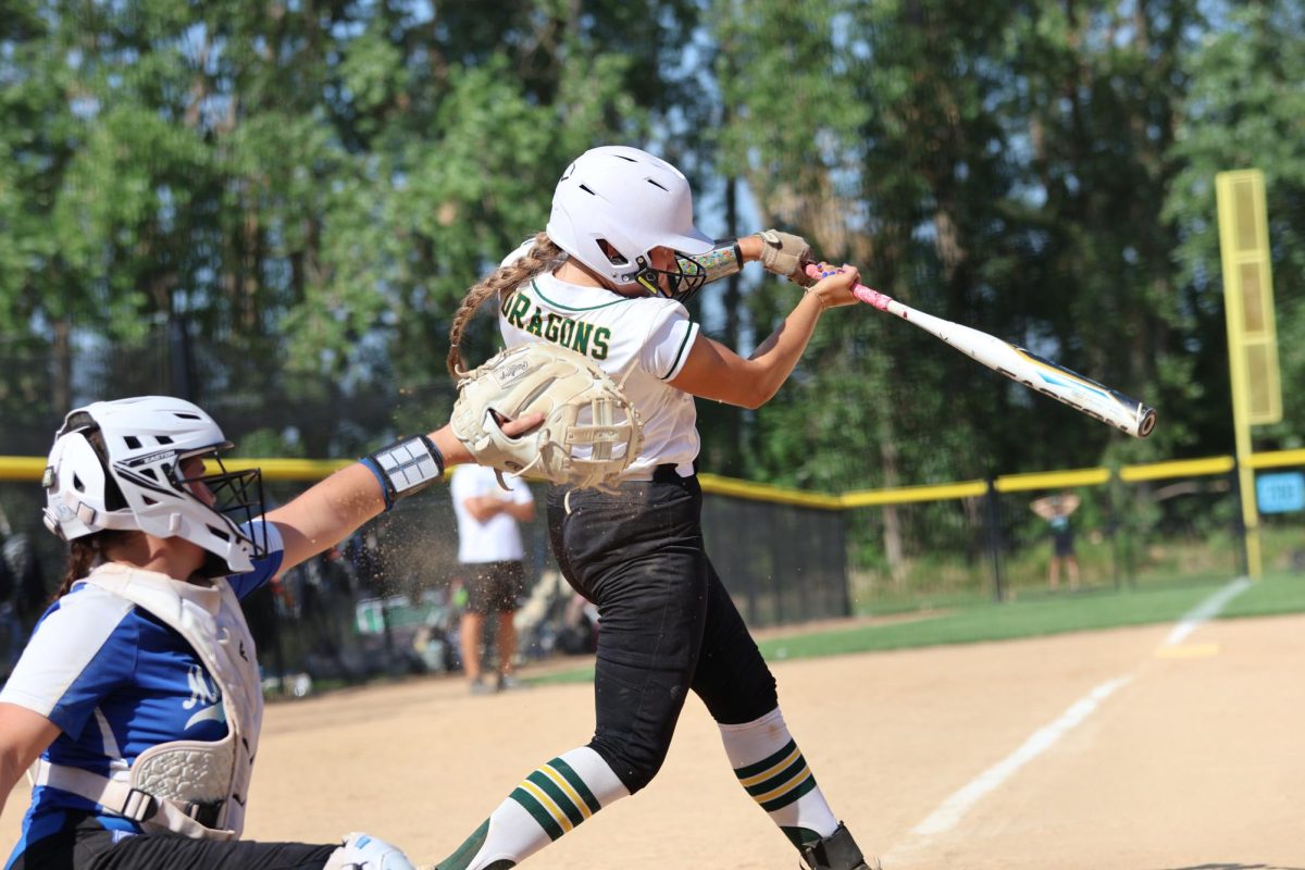 Senior Brylee Rupiper steps up to bat and hits with strength and precision.
