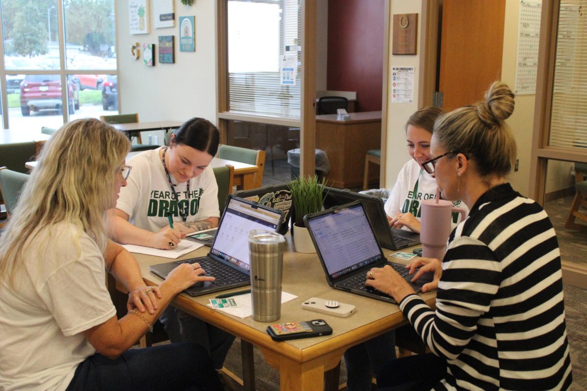 Counselor Melissa Ryan, English teacher Brooke Meador, counselor Shauna Reeves and counselor Jennifer Smith meet in the Counselors Office at Freshmen Day on Tuesday, Aug. 13.