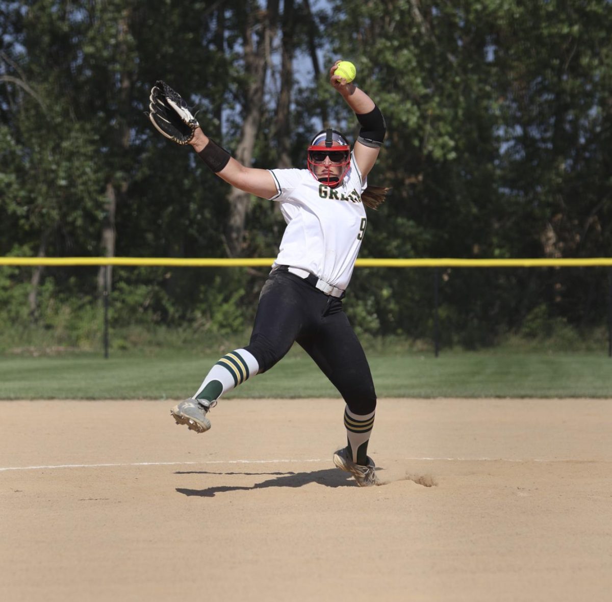 Senior Alexis Jensen pitches the ball in her final season as a Dragon.