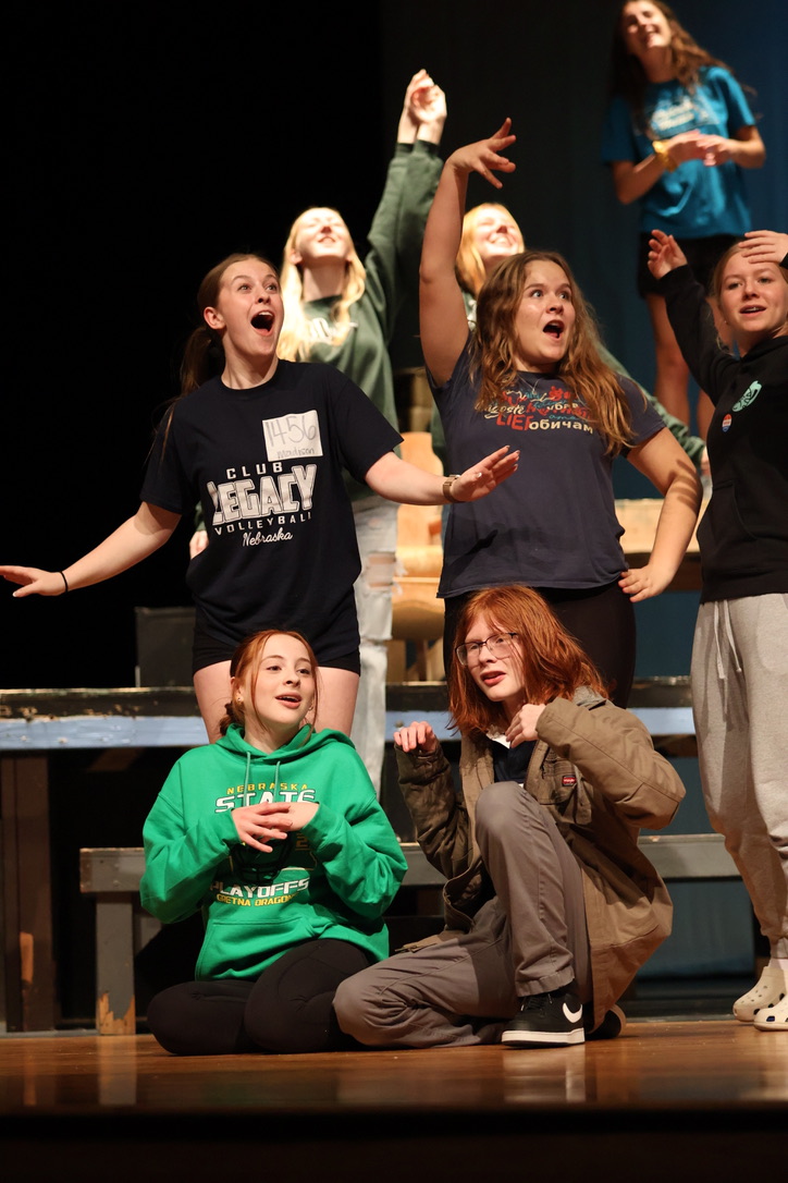 Junior Madison Davenport, Macy Cox, Sophomore Sawyer Long and freshman Miah Lindquist hit their first pose in the beginning of the show