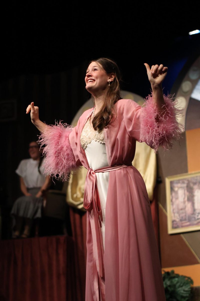 Junior Rebecca Roberts smiles happily while thinking about her approaching wedding. 