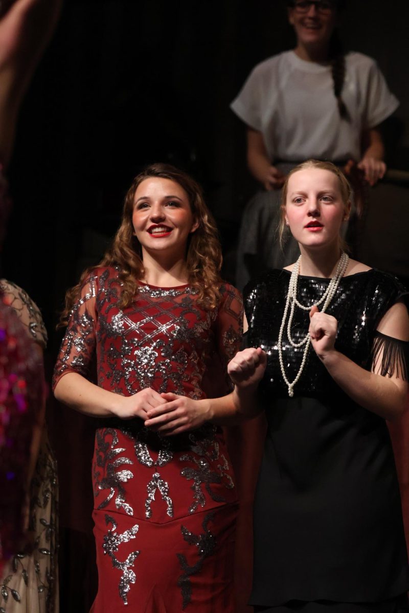 Sophomores Beth Wegner and Lillian Bock wait in anticipation for advice from the Drowsy Chaperone. 