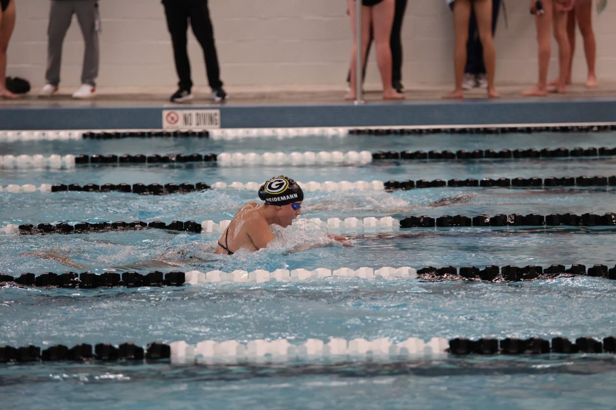 Freshman Tessa Heidmann finishes off a 25-yard breaststroke. 