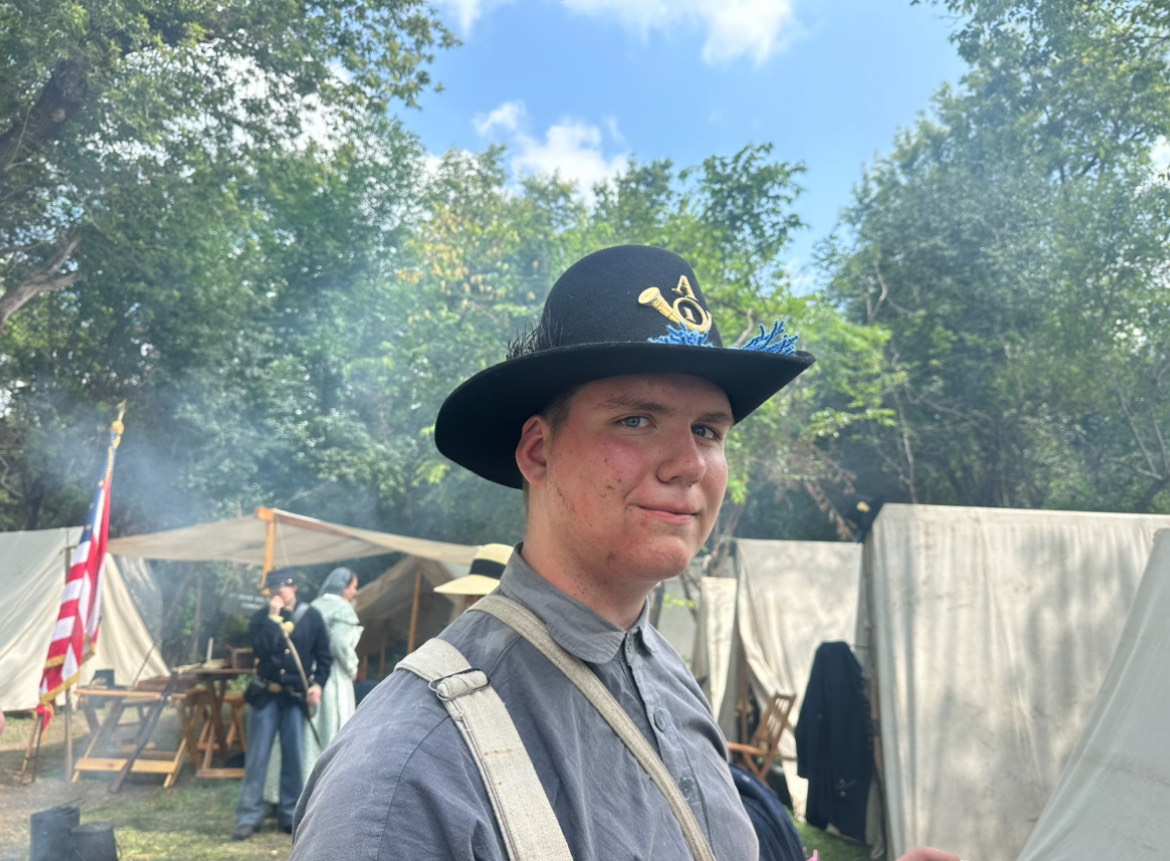 Tye Coldiron poses for a picture in his reenactment Civil War uniform at one of his reenactments.