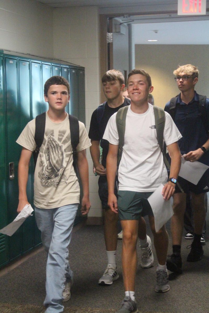 Freshmen walking through the halls on freshmen day.