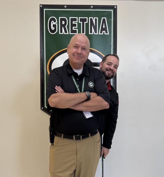 Mr. Steele is in the front, and Mr. Fleer is standing behind him.