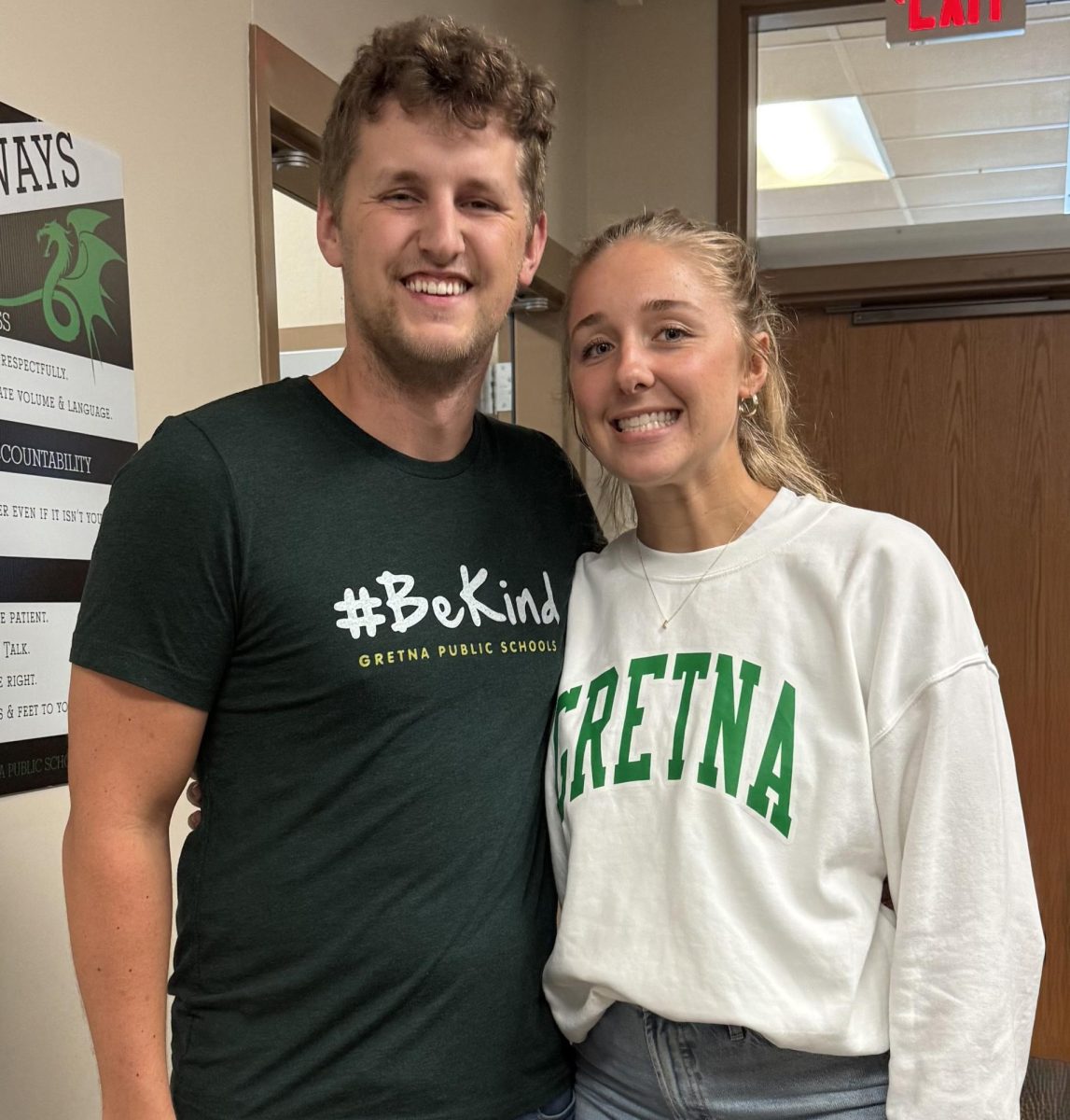 Colton and Kaitlyn Gronewold stand together for a picture as they start their new teaching journey at Gretna High School. He teaches math; she teaches business.