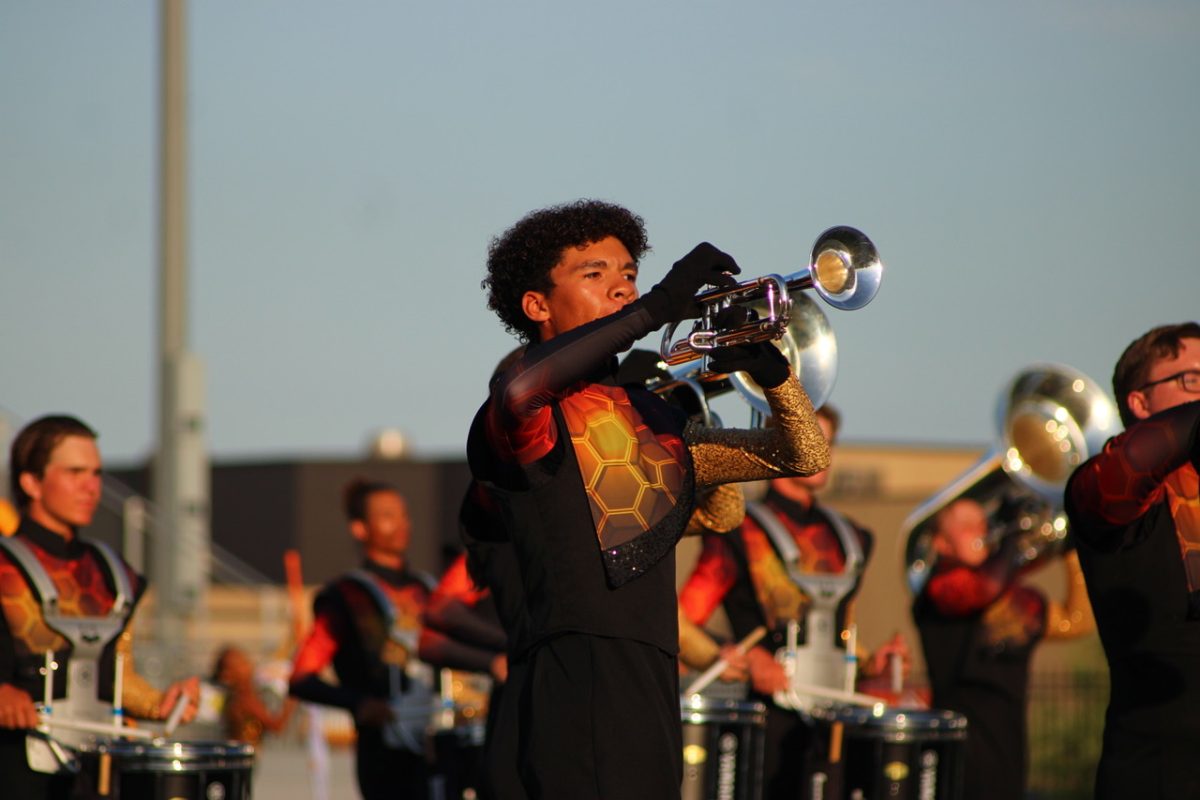 Sophomore Jude Webber spent last summer traveling the Midwest with the Colts, a drum and bugle corps that participates in DCI. “The best way to explain it is, think about marching band on a professional level,” Webber said.  Photo courtesy of @coltcadetsdci on Instagram