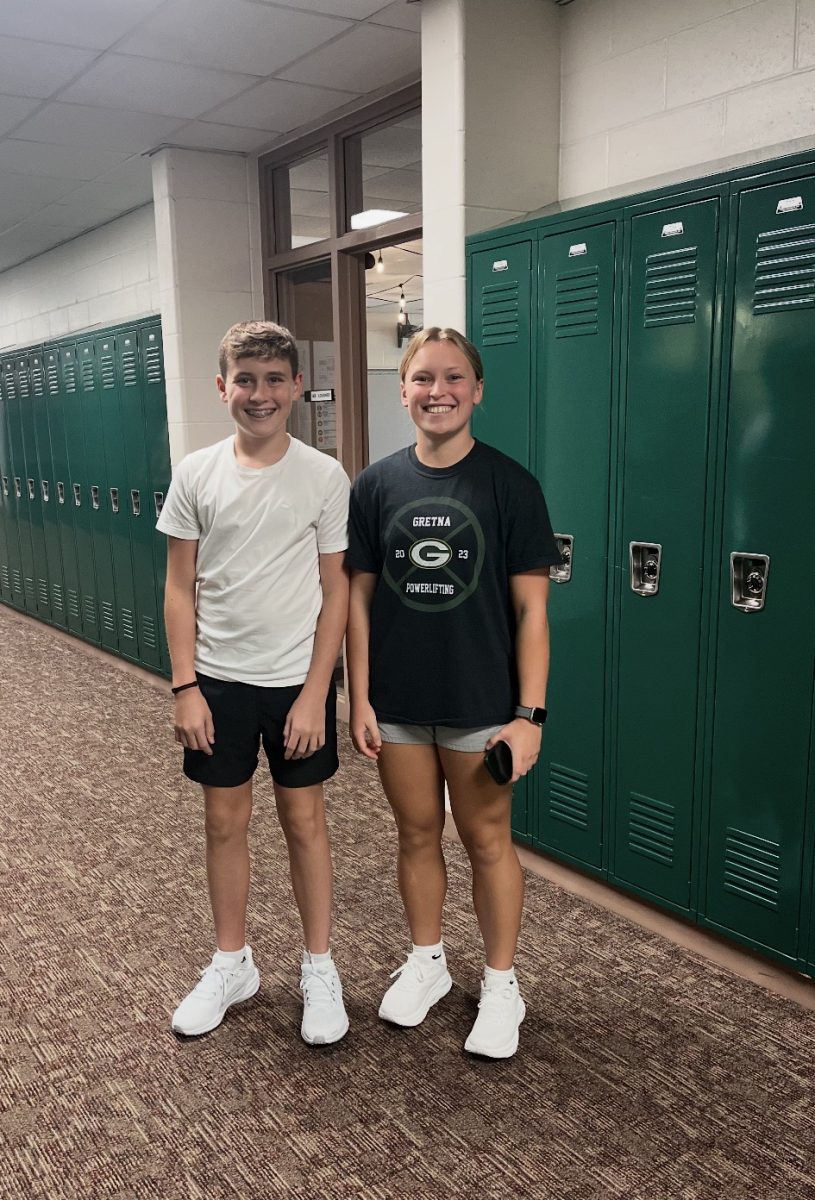 Smiling big, senior Sydney Malone and freshman Cody Malone.