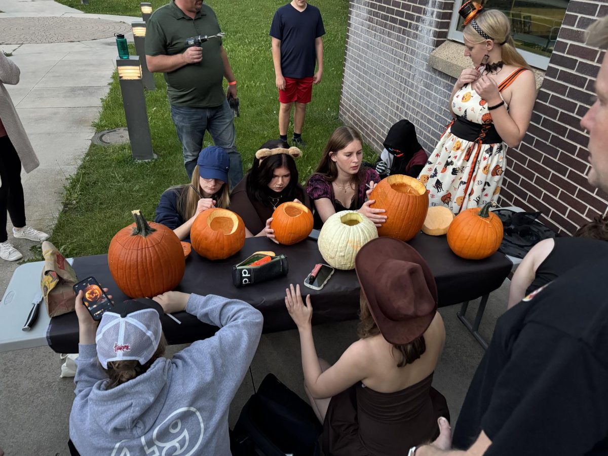 The German exchange students carved pumpkins on Oct. 16. Many events they attended and participated focused on American traditions and customs. Photo courtesy of Kelly Deane.
