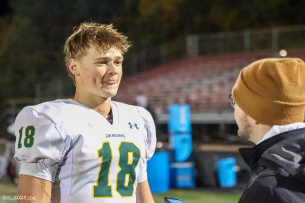 Junior Henry Hildebrand gets interviewed after a Hail Mary catch and a winning two-point conversion grab to win the game for the Dragons. The team trailed Norris by 10 with 1:58 left to go. Senior quarterback Michael Knudsen led two late scoring drives to help the Dragons pull off the amazing comeback.
