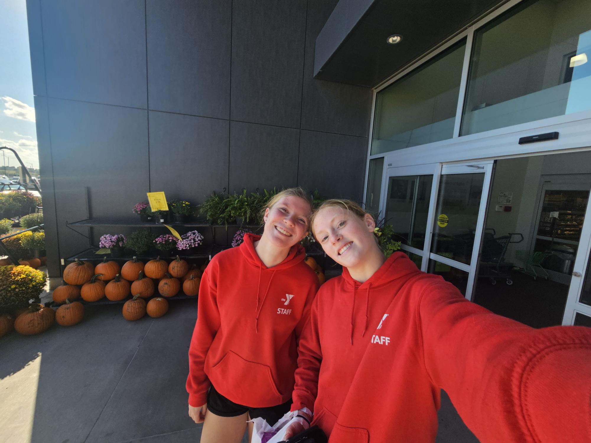  Madisyn Clarke-Wisnieski and Lauren VonSeggern pose for a photo together. Even though Clark-Wisnieski and Vonseggern go to different schools, their friendship still remains strong because of all the opportunities the community and schools provide for them to be together.