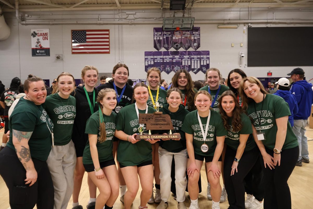 The GHS girls powerlifting team ended their season with a championship trophy. 