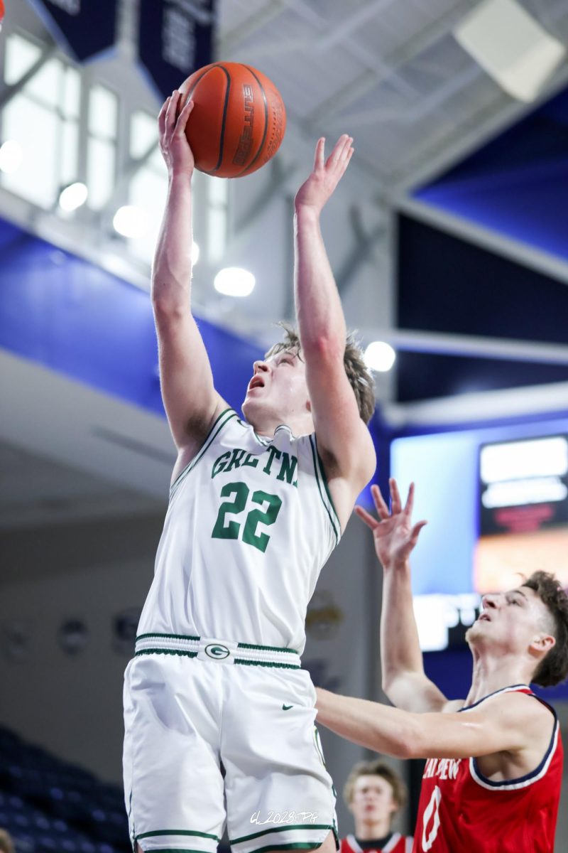 Junior Griffin Snyder drives to the basket and gets fouled. Snyder would make his free throw and cut into Platteveiw's lead.    