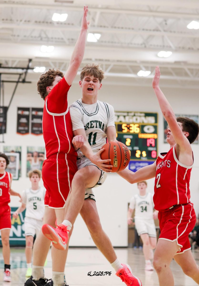 Senior Brantley Hack drives through traffic and puts up a layup. Hack drew the foul and made his free throws. 