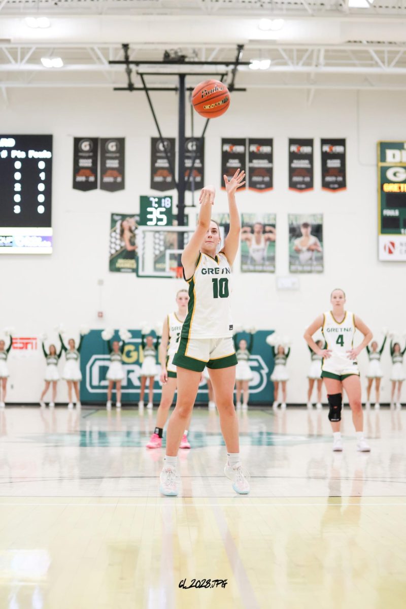 Junior Ava McArtor shoots free throws to help extend Gretna's lead over Seward.