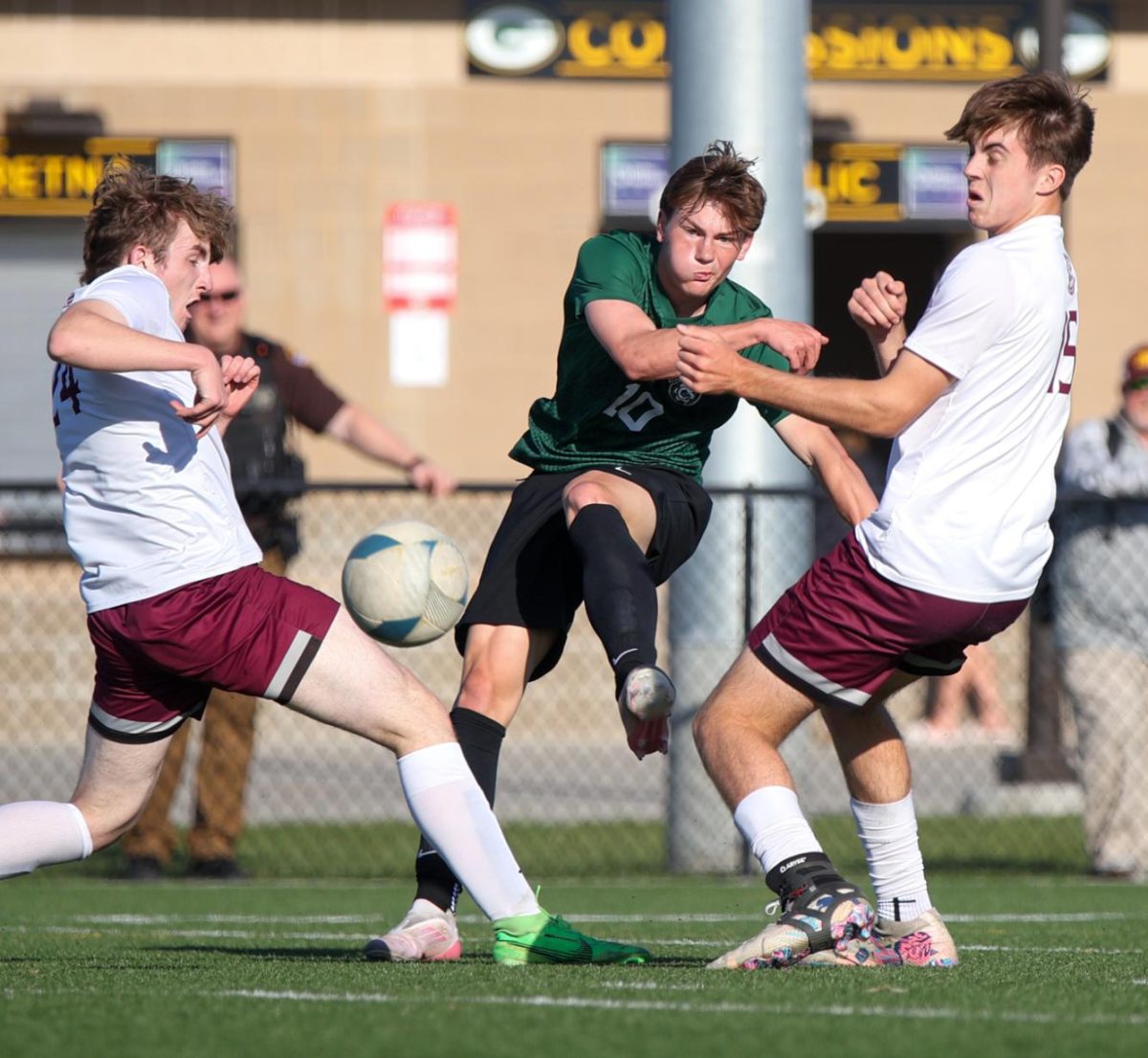 Freshman Nate Theillen runs through contact as he dribbles toward the goal. The Dragons beat Waverly 10-0 to advance to State.