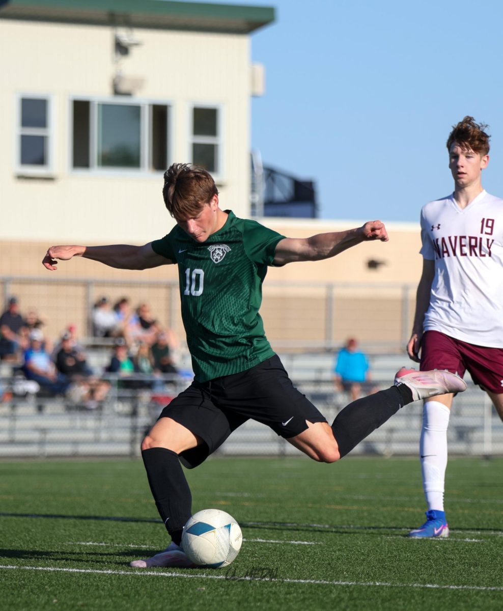 Freshman Nate Theillen shoots at the goal during the NSAA District final vs. Waverly.